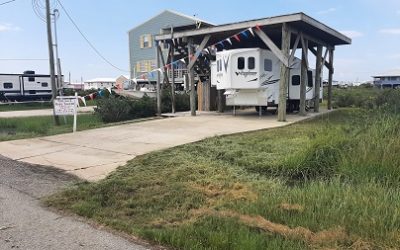 203 Peach Ln. Grand Isle…R/V site and 31′ gooseneck R/V located on site….great wetland wildlife view!! NEW PRICE!!
