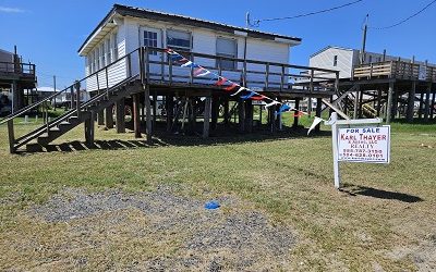 117 Fir Ln. Grand Isle, La. 70358  This is a 2 br/1 Bath camp on large lot with a bay and beach view.